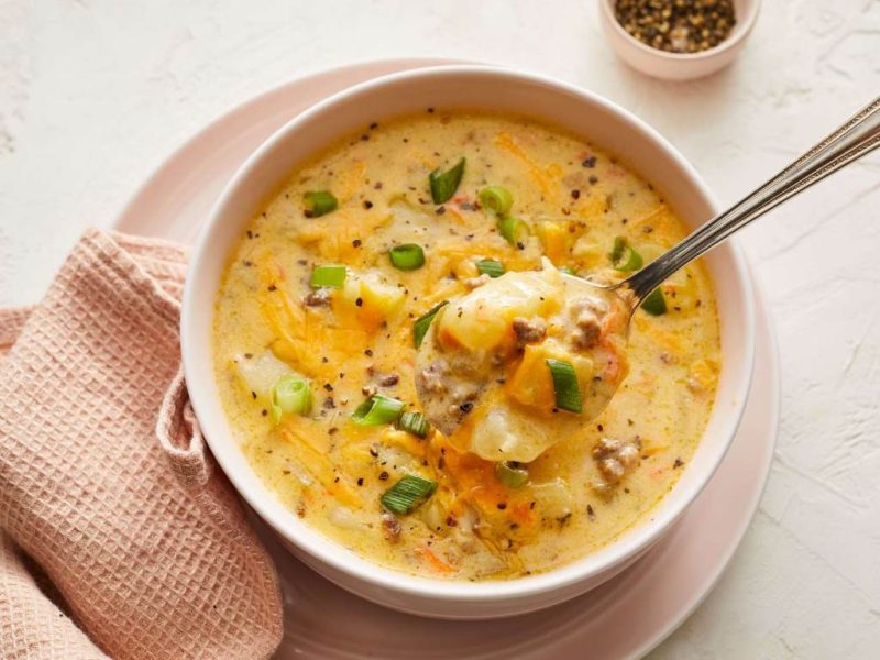 Bowl of creamy cheeseburger pasta soup with ground beef and macaroni