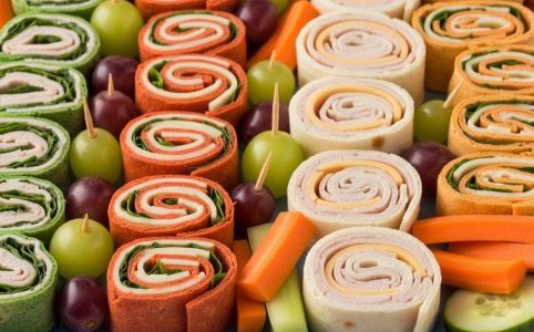 Colorful sandwich roll-ups with turkey and cheese for picky eaters