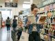 Austin parent reading nutrition labels in a grocery store in 2026